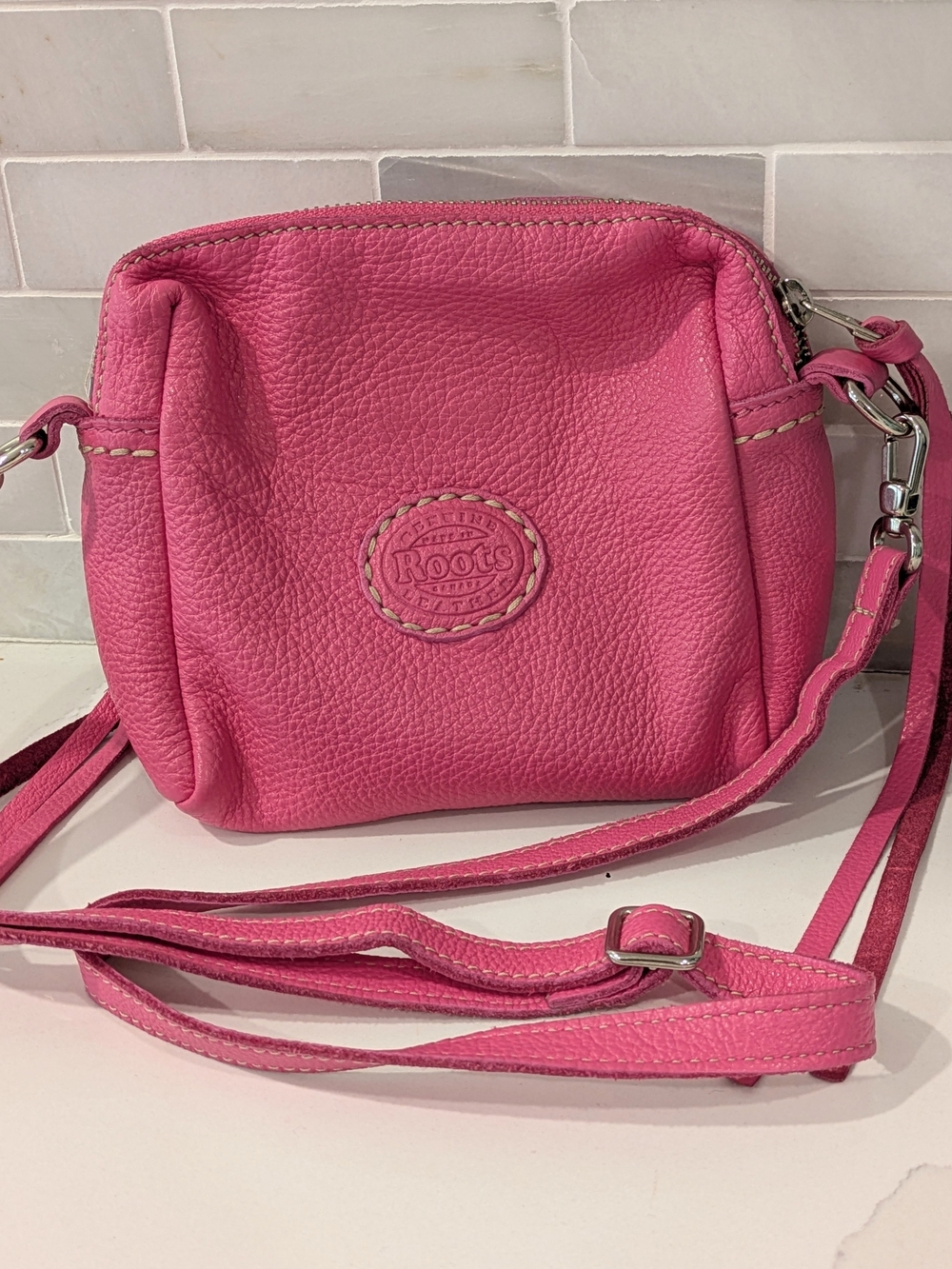 Roots Pink Leather Crossbody Bag